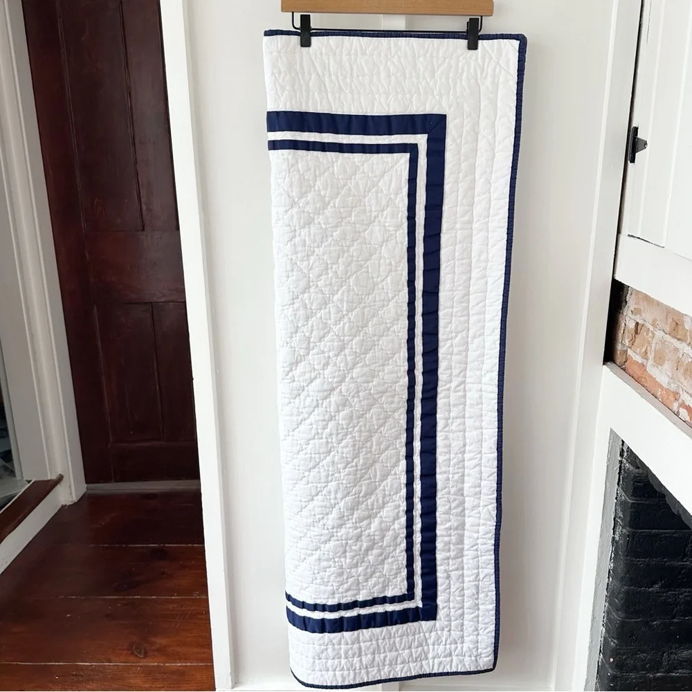 POTTERY BARN KIDS white Harper navy trim baby quilt
